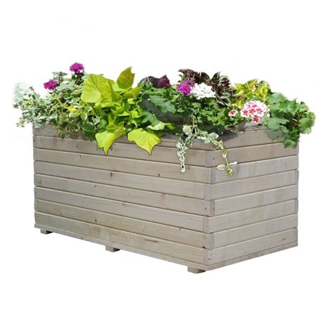 Vyvýšený drevený záhon s rastlinami