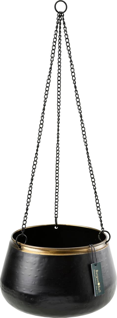 Závesný kvetináč s bylinkami v kuchyni