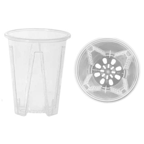 Priesvitný kvetináč s orchideou a vzdušnými koreňmi