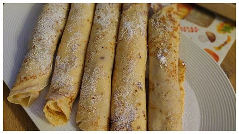 Plnenie palacinky jogurtovým krémom a čerešňovou marmeládou